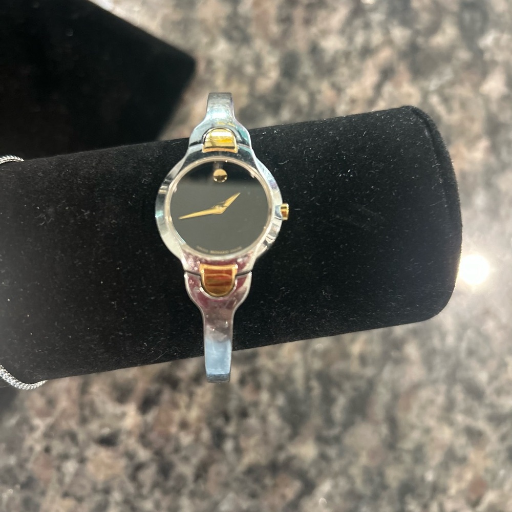 Elegant Black and Gold Movado Women's Watch